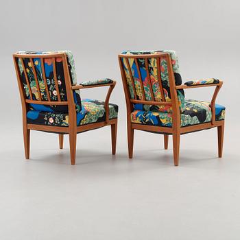 A pair of Josef Frank mahogany armchairs, Svenskt Tenn, model 868.