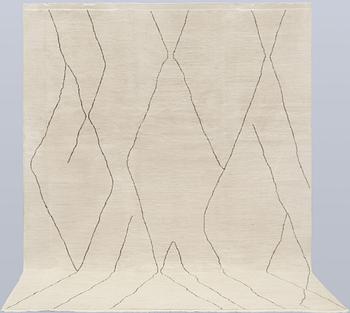 A Moroccan carpet, 335 x 258 cm.