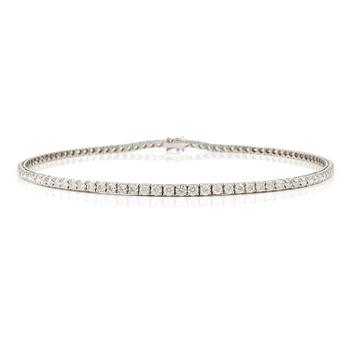 512. An 18K white old and round brilliant cut diamond tennis necklace.
