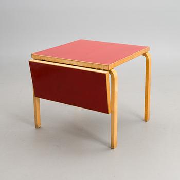 A mid-20th century drop leaf table for Artek Finland.