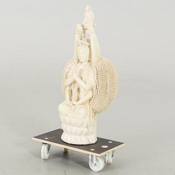A porcelain figurin, late 20th century,
