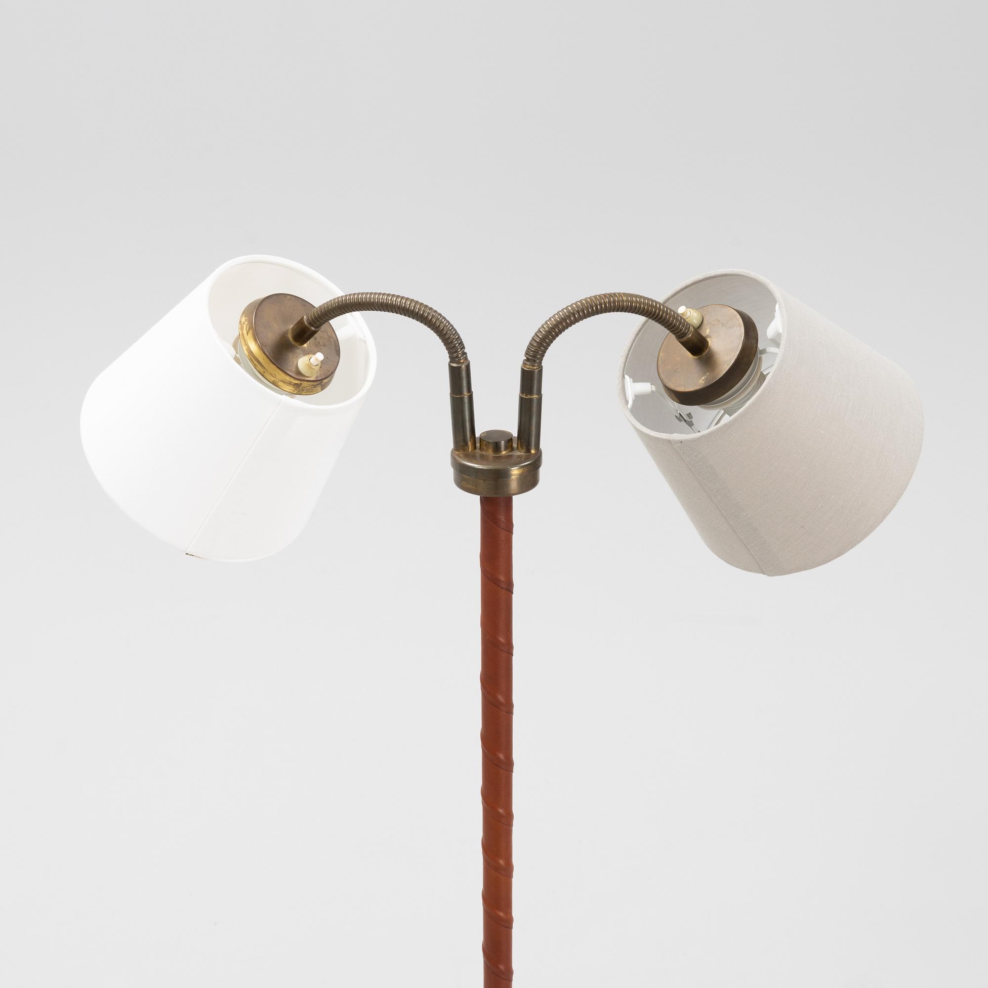 A mid 20th Century double headed floor lamp.
