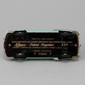 a Schuco "Elektro Ingenico 5311" car, Germany ca 1950.