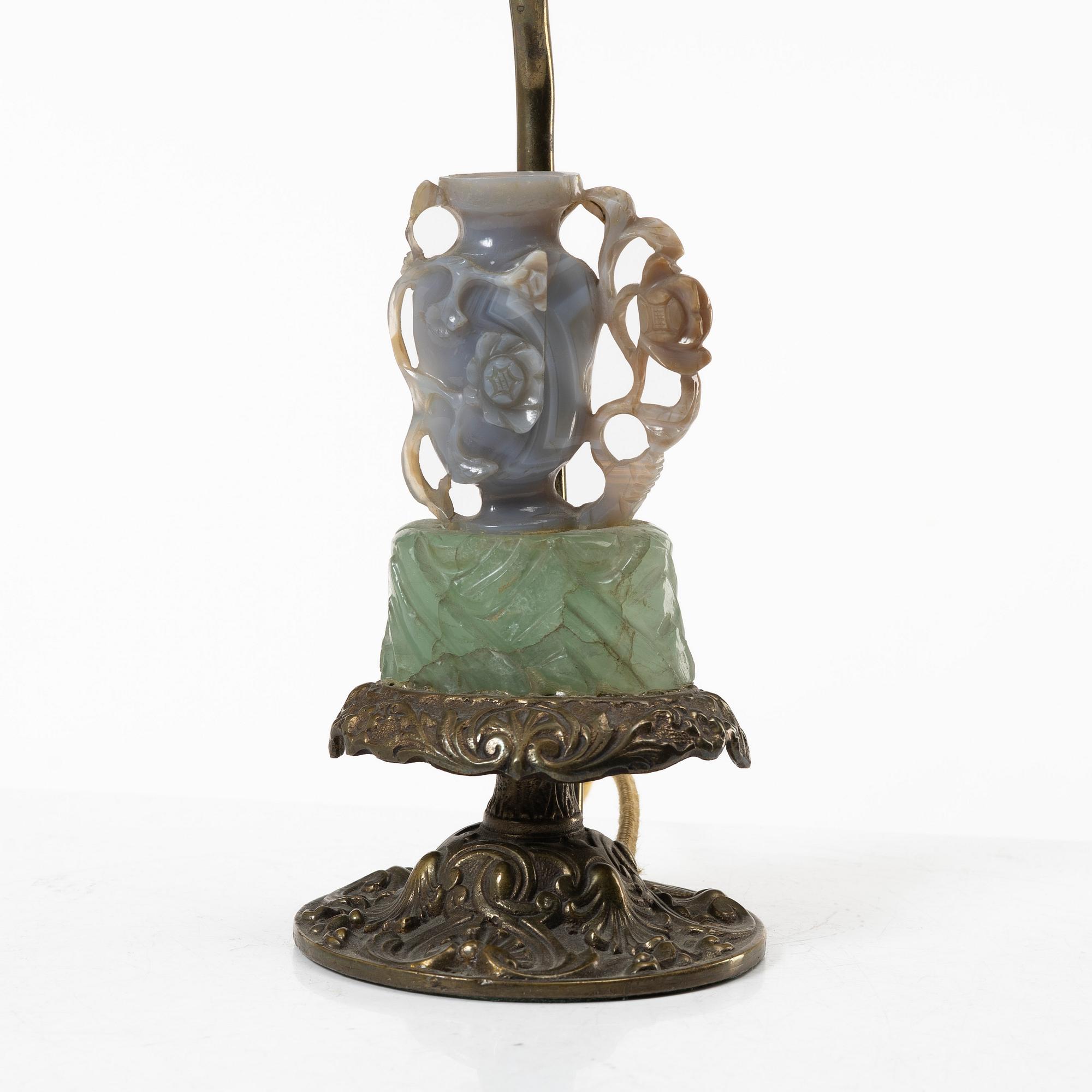 A Chinese table lamp with a carved stone vase with cover, 20th century.