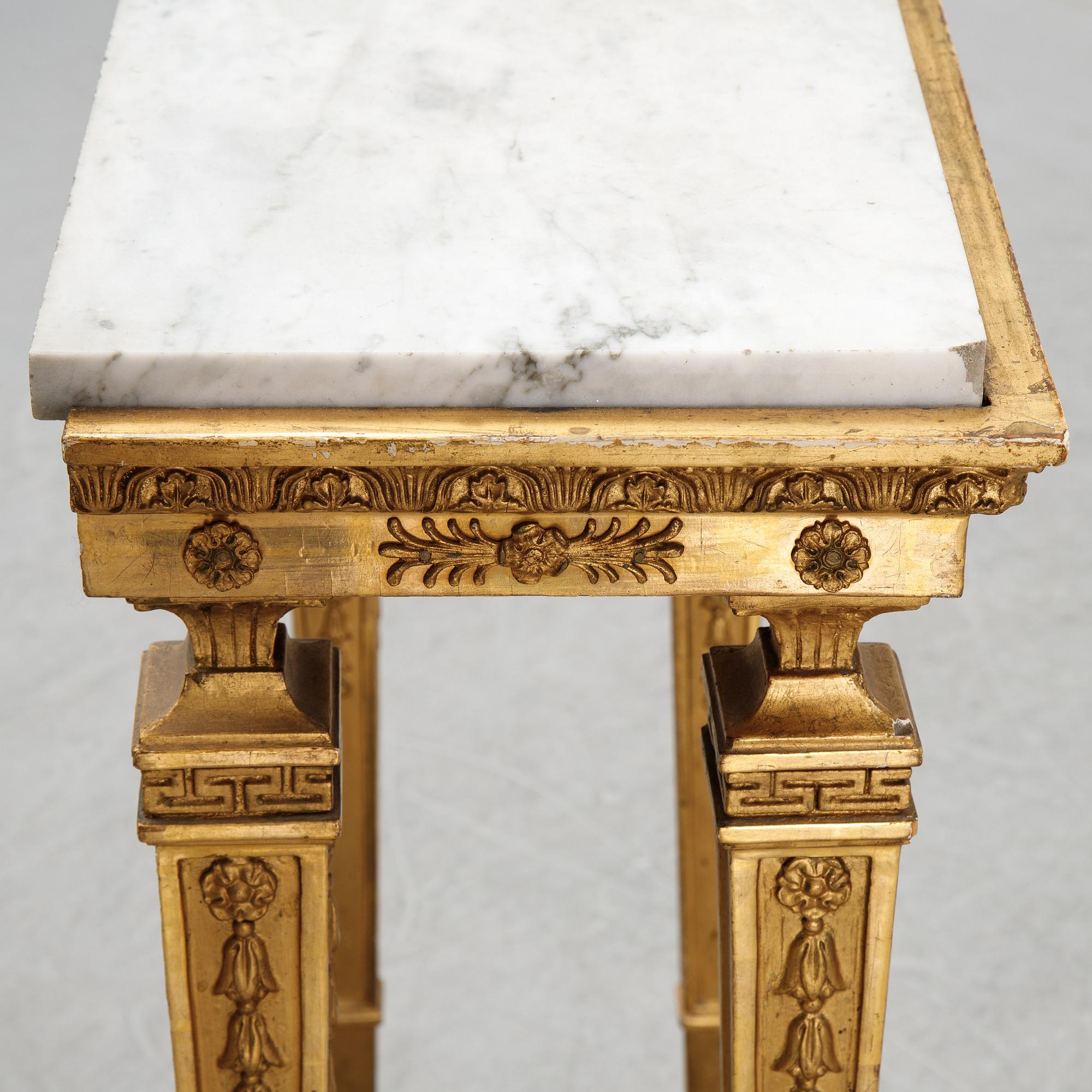 An early 19th Century console table.