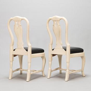 A pair of Rococo style chairs, early 20th century.