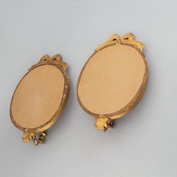 A mirror and a pair of mirror scones, gustavian style, 20th century.