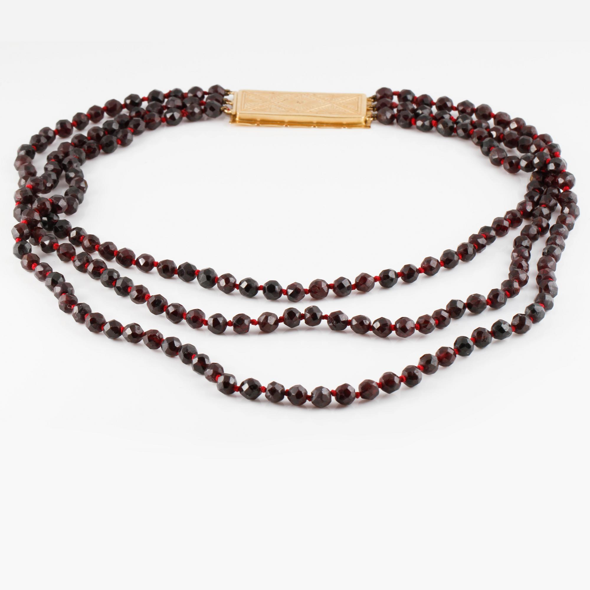 COLLIER, 18K guld med fasettslipade granater, Piacenza, Italien.