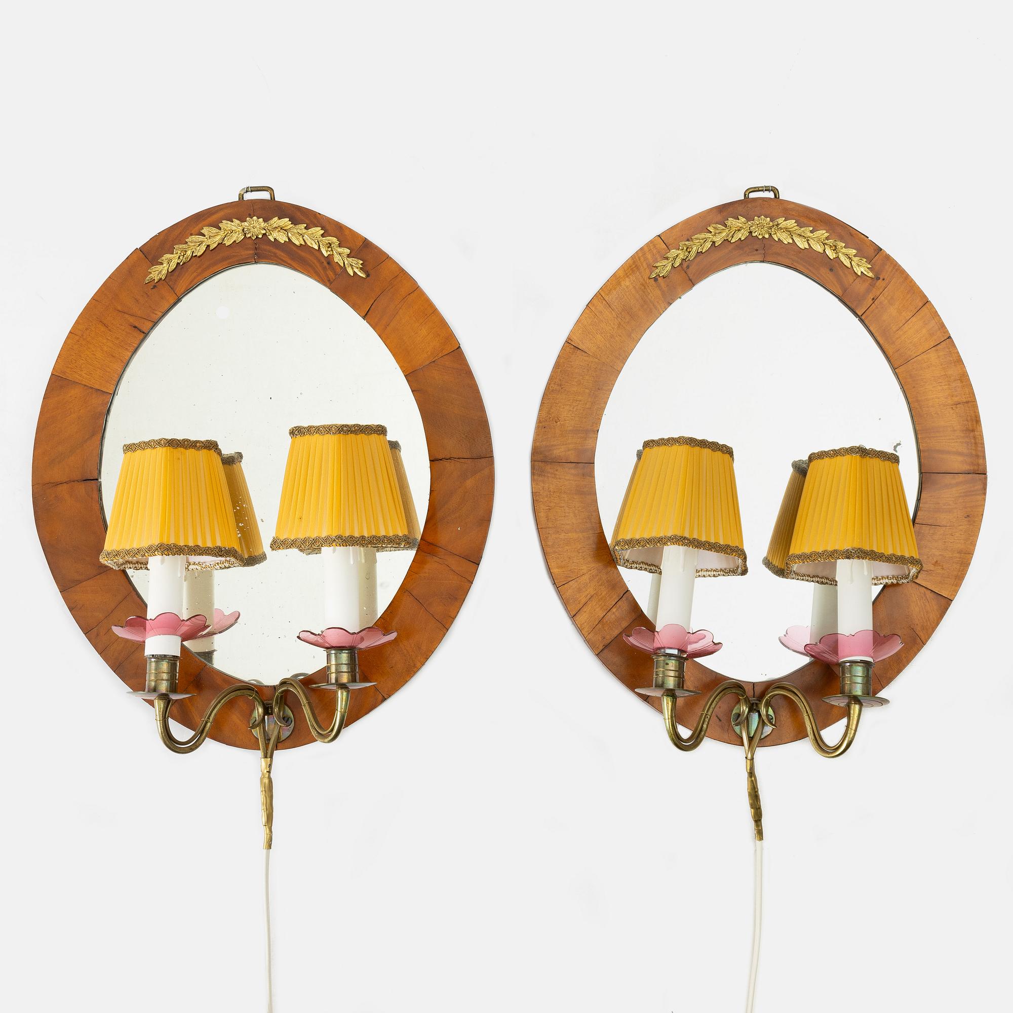 A pair of Swedish Empire mirror sconces, first half of the 19th century.
