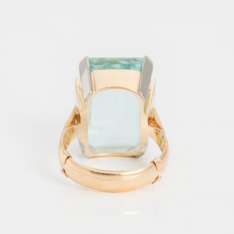 A step-cut aquamarine ring.