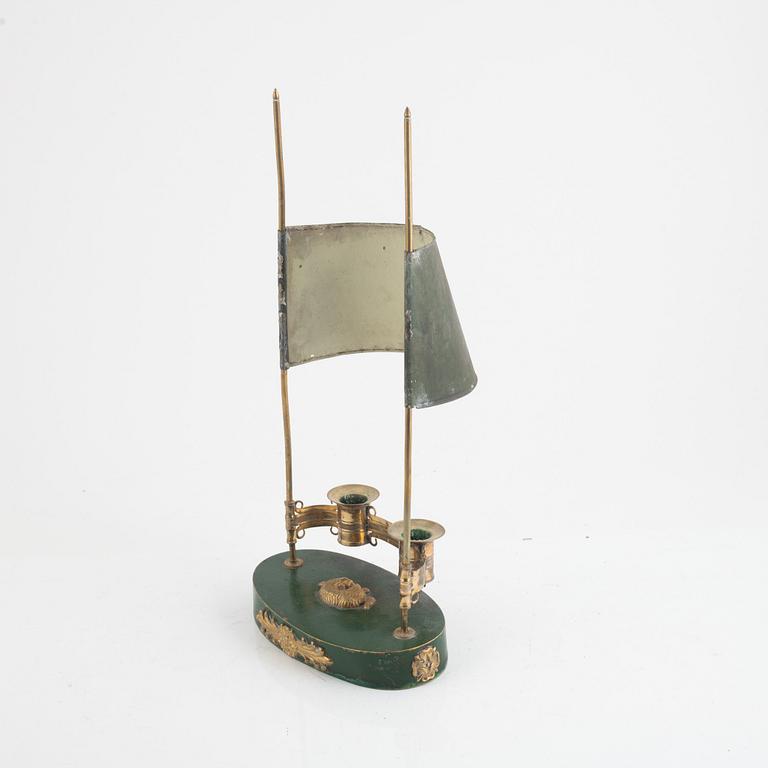 A swedish Empire two-light gilt-brass and tôle-peinte reading lamp, early 19th century.