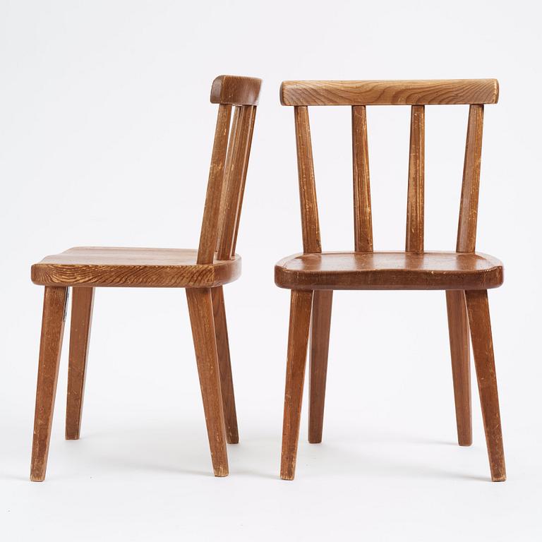 Axel Einar Hjorth, a set of four 'Utö' pine chairs, Nordiska Kompaniet, Sweden 1930s.