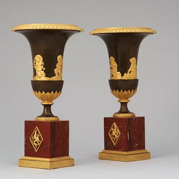 A pair of French Empire early 19th century urns.