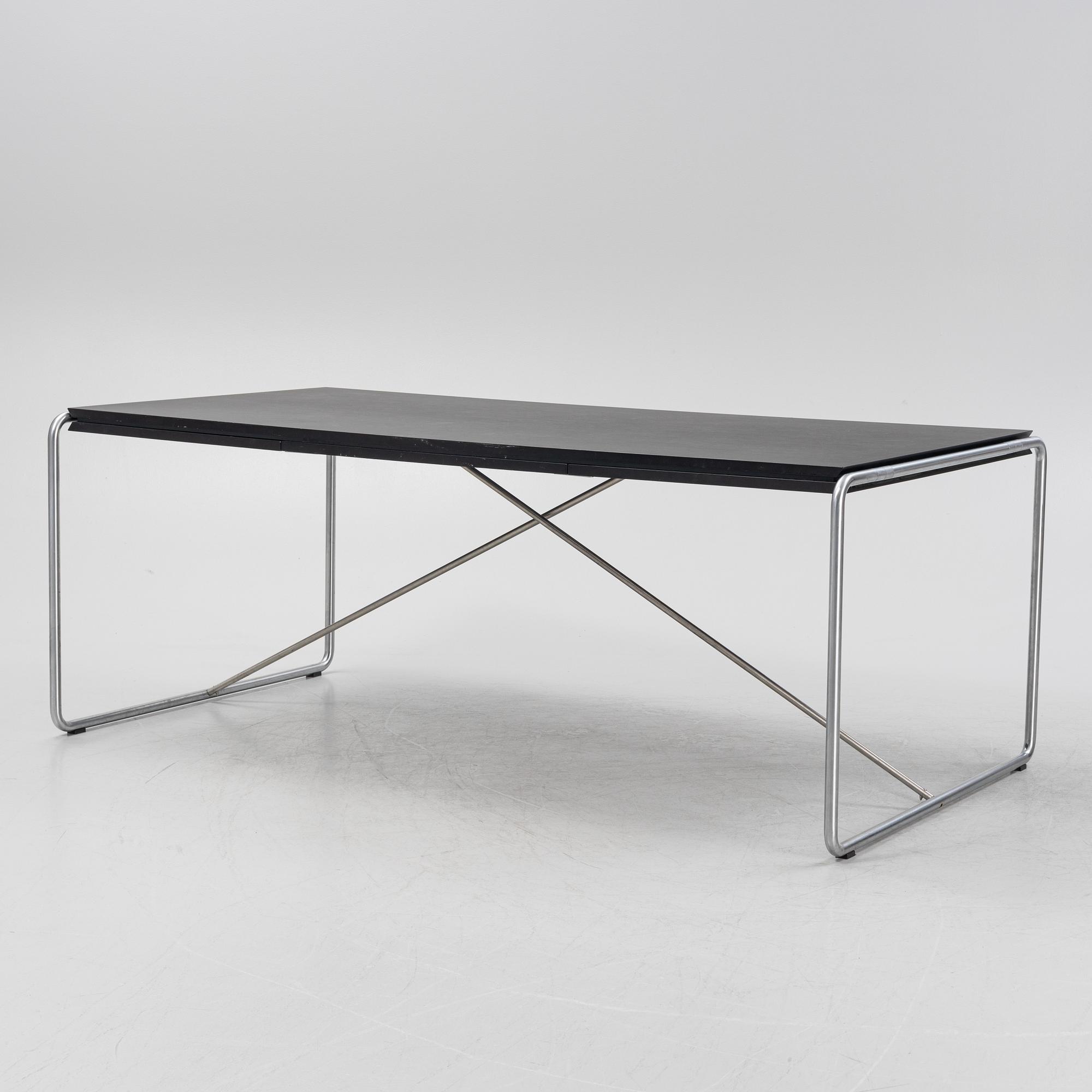 Niels Jørgen Haugesen, a model 4750 dining table, Fredericia, Denmark.