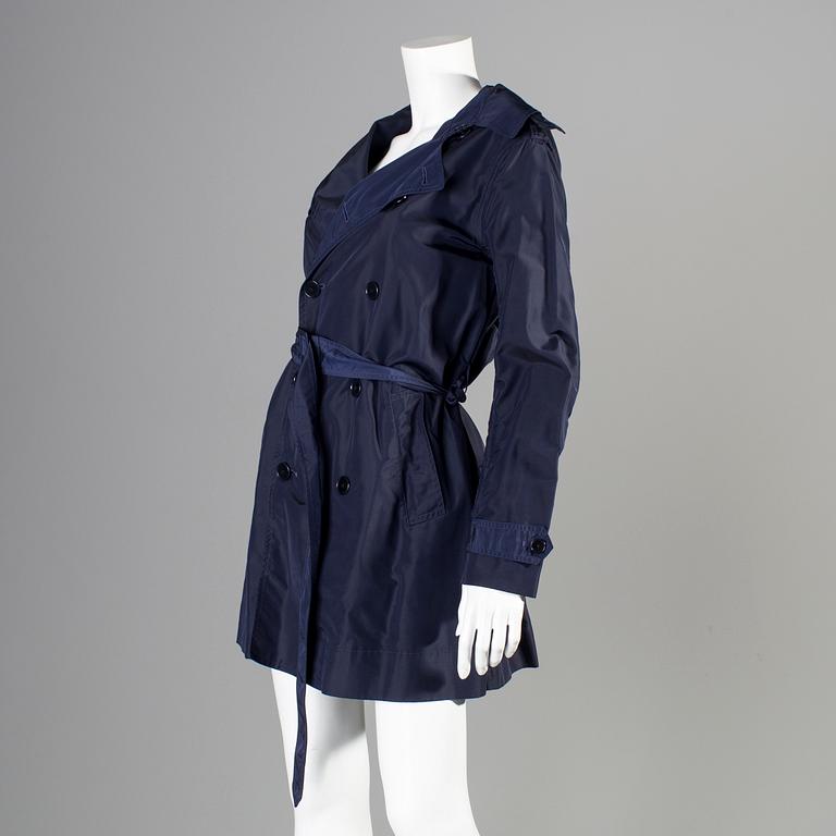 A blue nylon trenchcoat by Ralph Lauren.