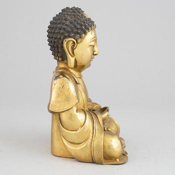 A bronze buddha, Ming style, 20th century.