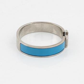 Hermès, a 'Clic H' bracelet.