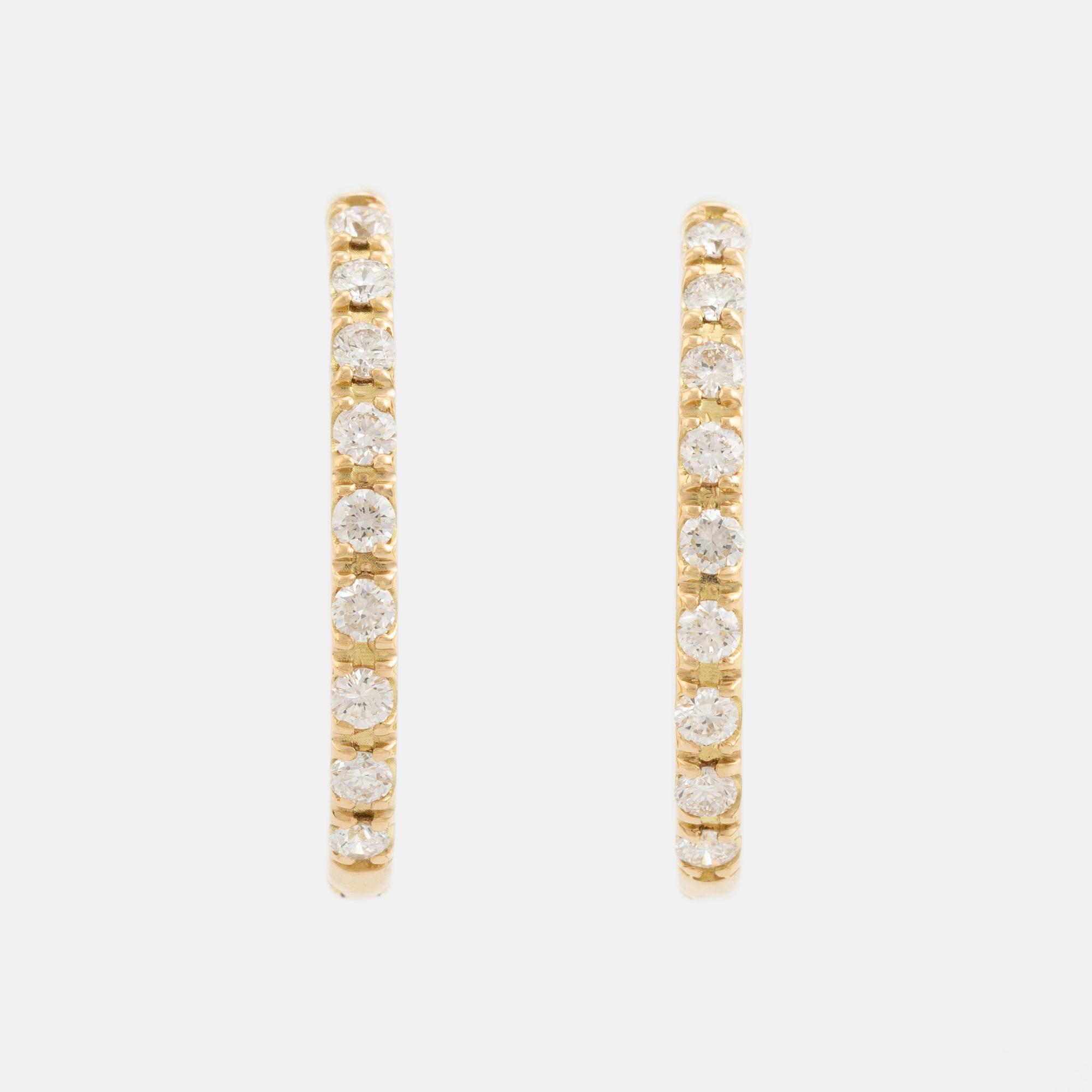 Brilliant cut diamond hoop earrings.