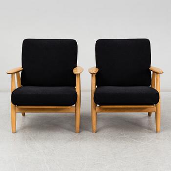 HANS J WEGNER, a pair of 'GE-240'/'Cigarren' oak easy chairs, Getama, Denmark.