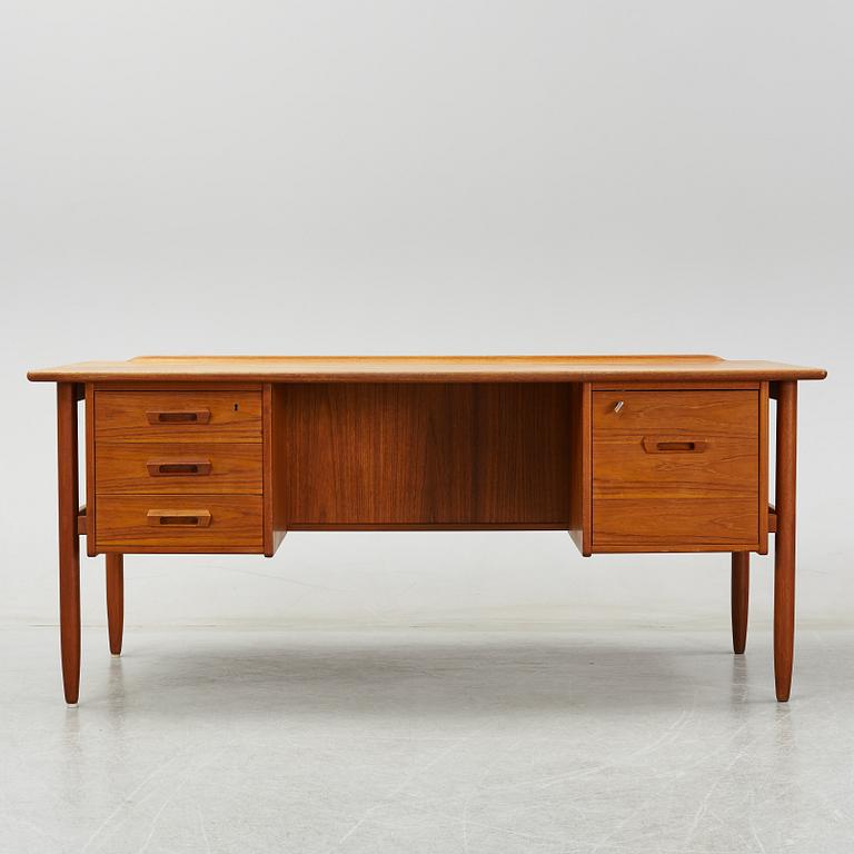A 1950/60's teak writing desk.