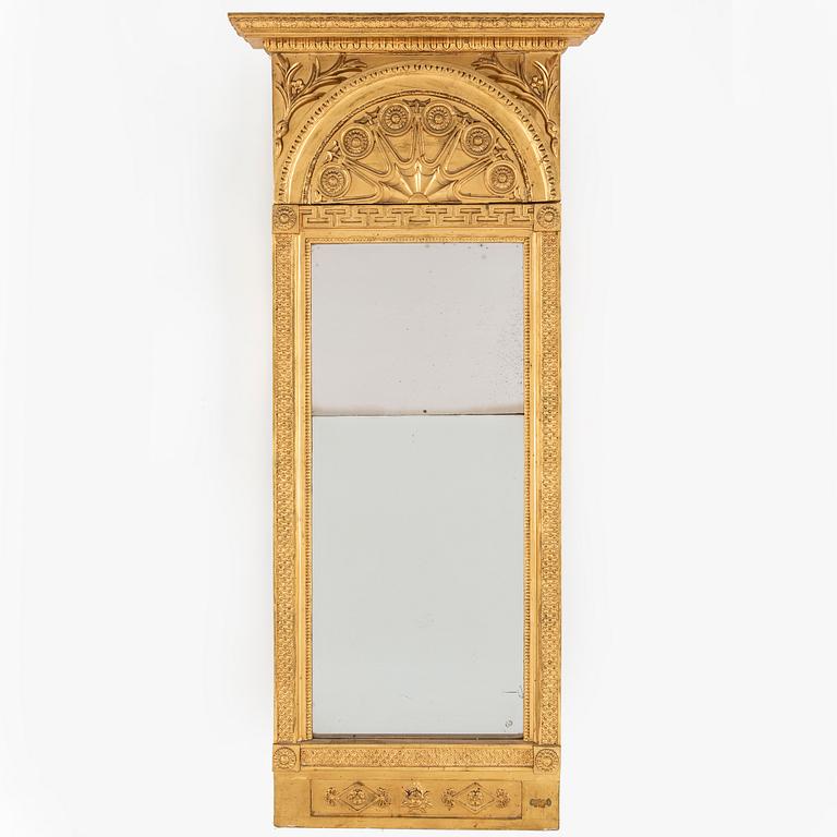 A Swedish Empire mirror, early 19th century.