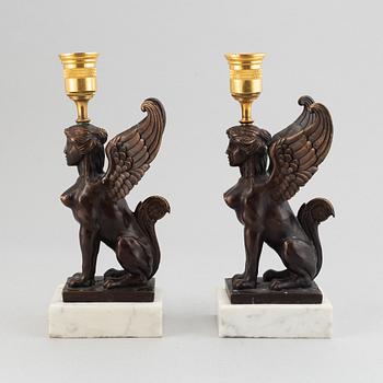 A pair of presumably Russian Empire candlesticks, early 19th Century.