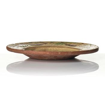 An earthenware dish, dated 1792.