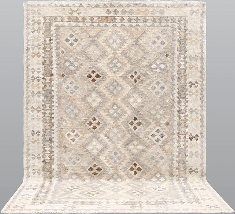 A Kilim rug, approx. 299 x 200 cm.