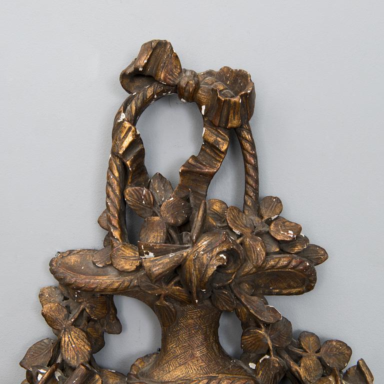 A 18th century wall clock.