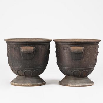 Ivar Johnsson, a pair of "Venus" cast iron urns, Näfveqvarns bruk, Swedish Grace.