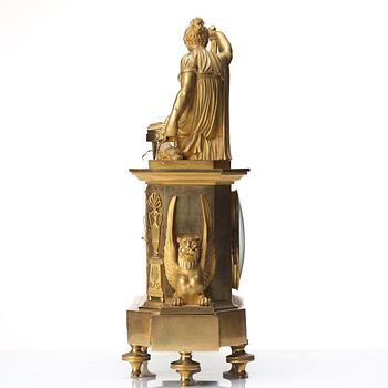 A Empire early 19th century gilt bronze mantel clock.