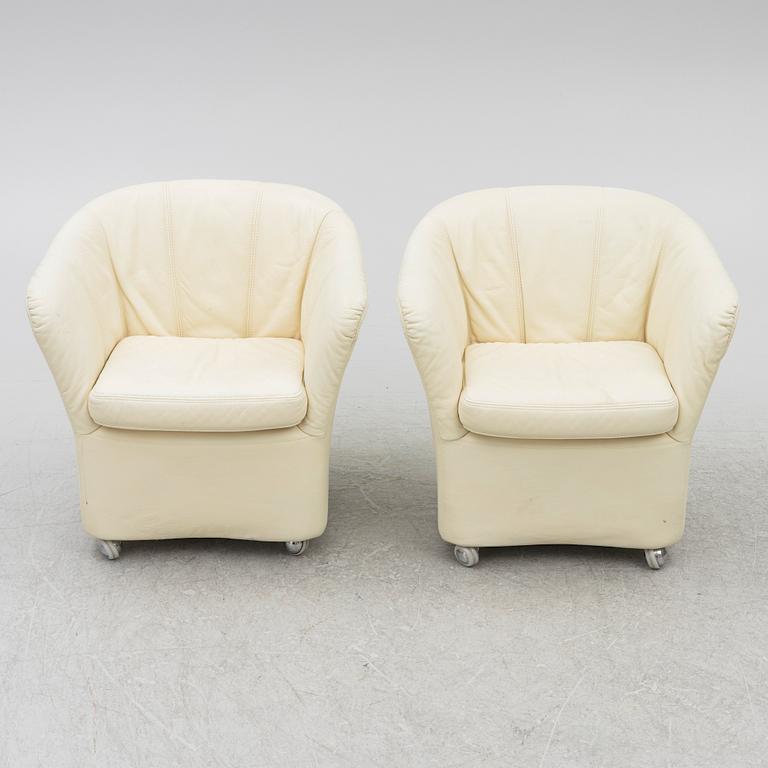 A pair of leather armchairs, Dux, Sweden, 1980's.