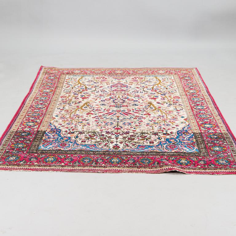 A Keshan silk rug, ca 198x129 cm.