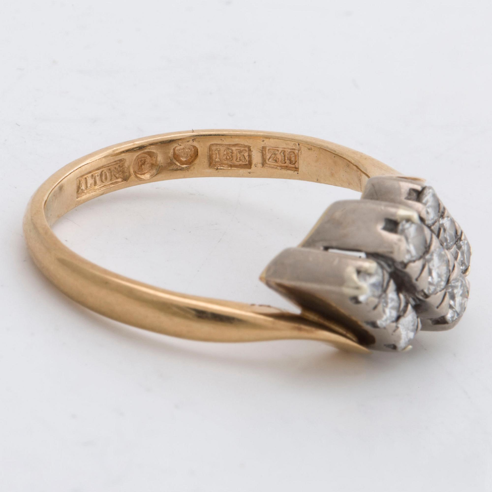 RING 18K vitguld m 9 briljanter 0,60 ct enligt gravyr, ALTON Falköping 1998.