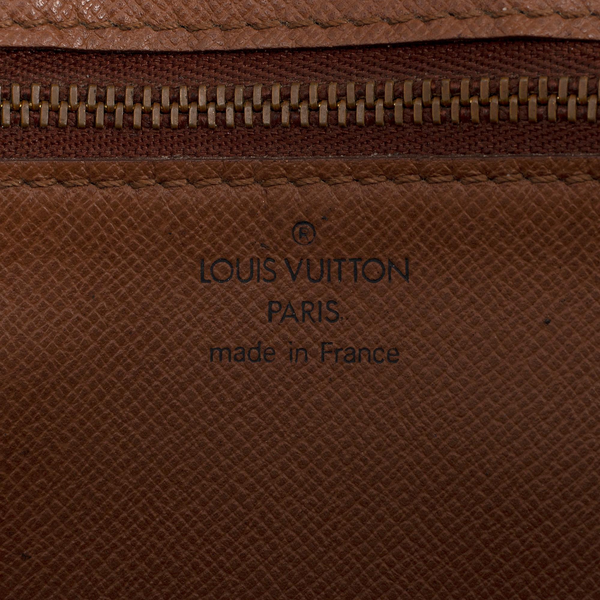 LOUIS VUITTON, a monogram canvas folder / clutch.