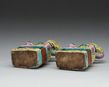 A pair of famille rose censer-stick holders, Qing dynasty, Qianlong (1736-95).