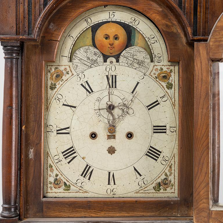 An oak longcase clock, 19th Century.