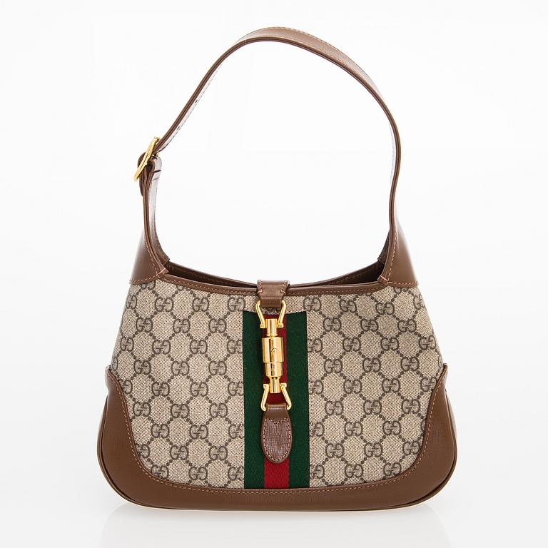 Gucci, a monogram 'Jackie' Bag.