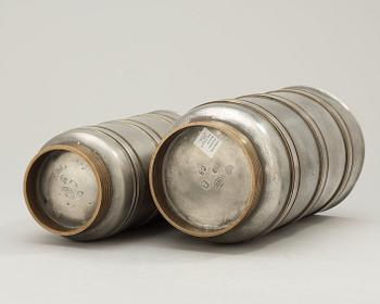 Two Edvin Ollers pewter and brass vases, Schreuder & Olsson, Stockholm 1937 och 1960.