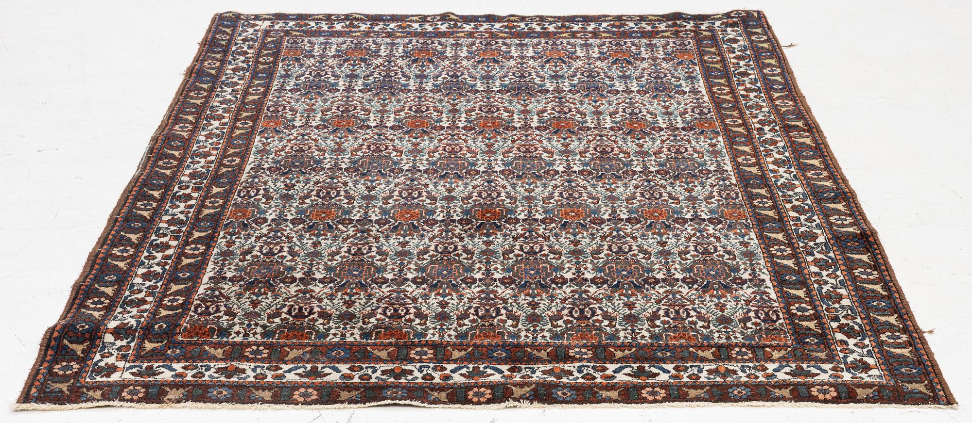 An antique/semi-antique Abadeh rug, Western Iran, c. 202 x 150 cm.