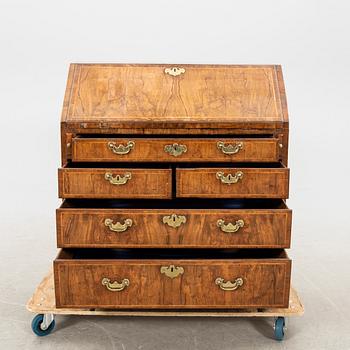 A walnut and mahogany writing bureau, mid-18th century late Baroque.