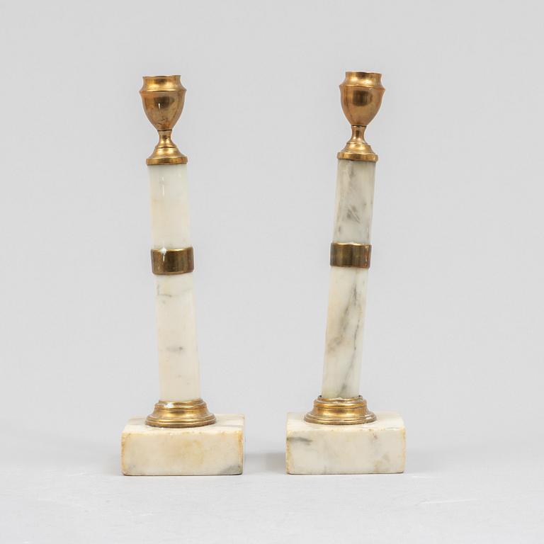 A pair of Gustavian style candelsticks, 13th/20th century.