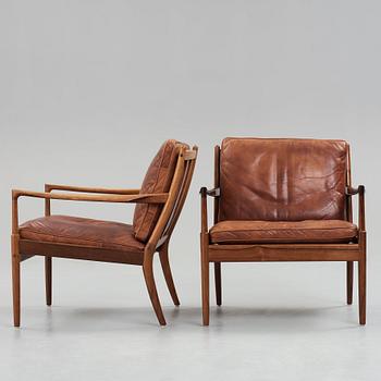 Ib Kofod Larsen, a pair of "Samsö" palisander and brown leather easy chairs, Olof Persons Fåtöljindustri (OPE) Sweden 1960's.