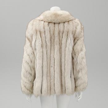 A Saga fox fur jacket, size L.