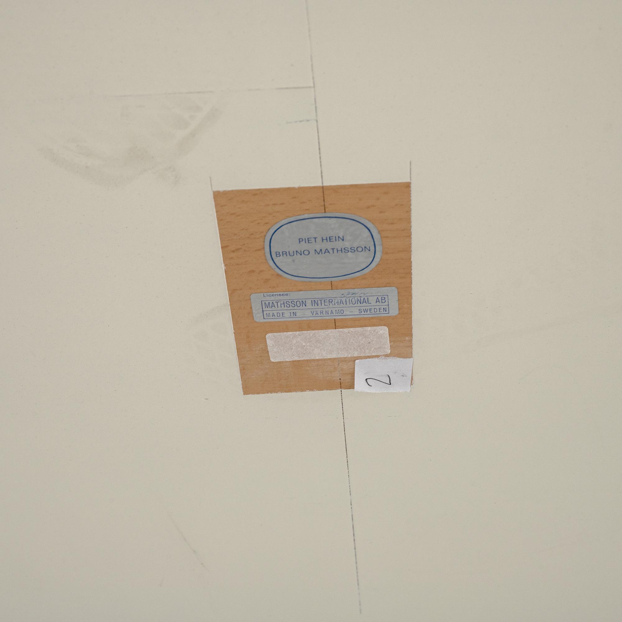 A 'Superellips' table by Piet Hein & Bruno Mathsson by Mathsson International, Värnamo.