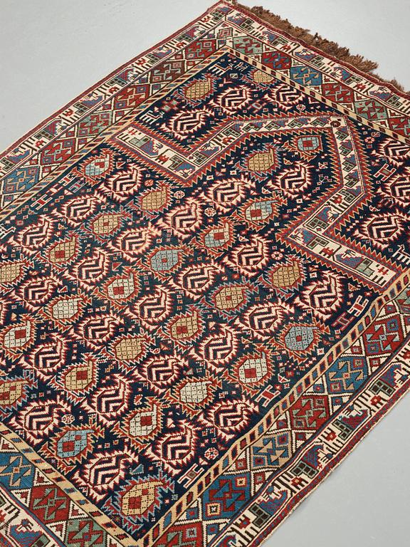 A RUG, an antique Marasali prayer rug, 19th century, ca 151 x 119 cm.