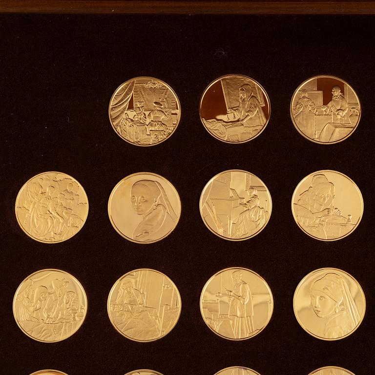 Silver Gilt Coins with motifs after Jan Vermeer, Franklin Mint (31 pieces).