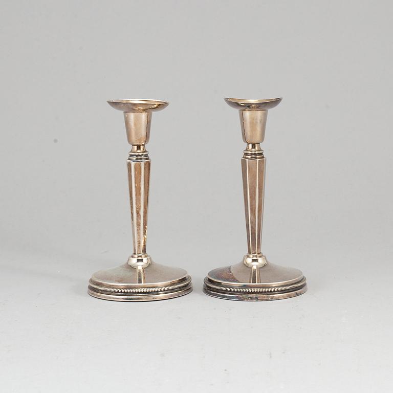 A pair of Swedish 20th century silver candlesticks, mark of Erik Löfman, Uppsala 1979.