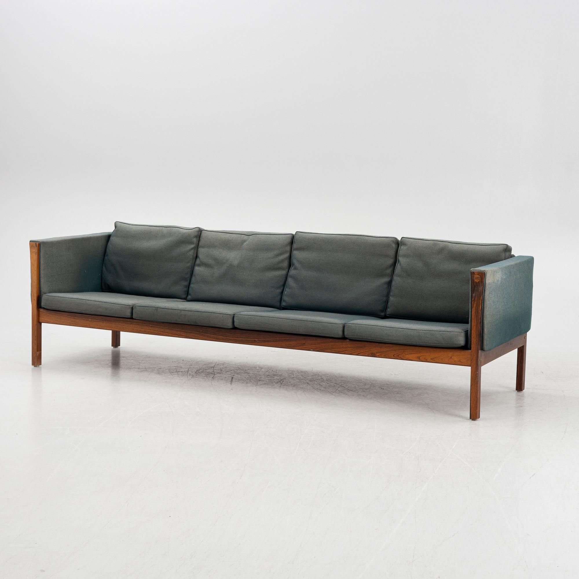 Hans J. Wegner, a model AP62/4 sofa and model AP62/1 armchiar,