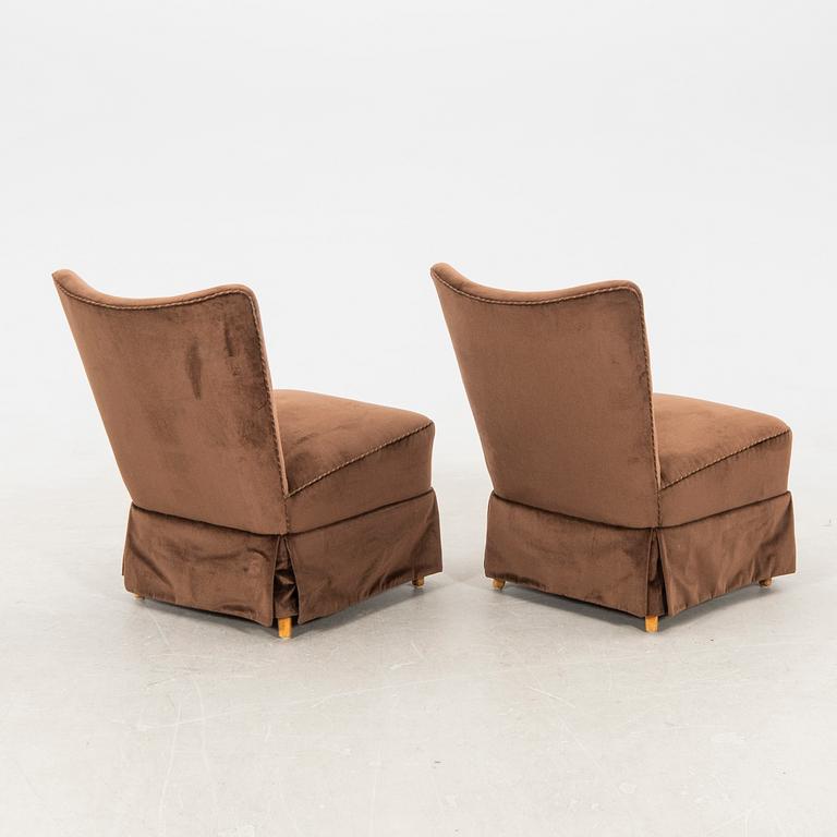 Armchairs, a pair from the 1940s.